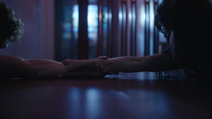 Millie and Tim's arms fusing together 