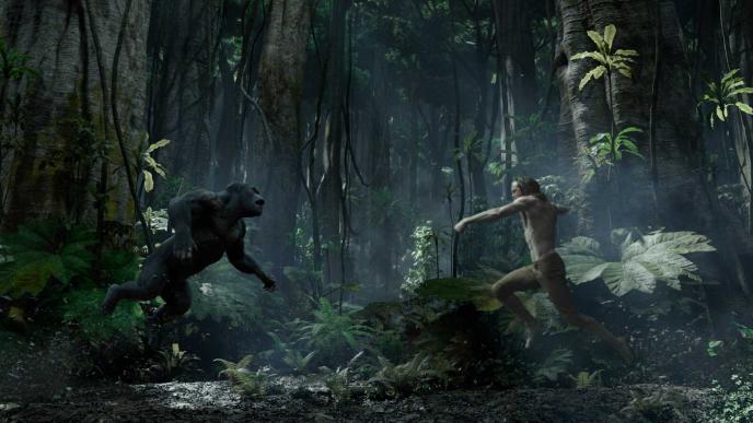 Tarzan and a CGI animated ape charging towards each other in a jungle