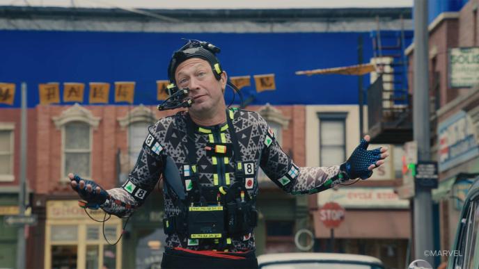 Ebon Moss-Bachrach in a motion capture suit, shrugging on the set of The Fantastic Four: First Steps