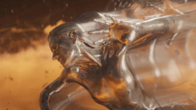 The Silver Surfer fights as they are pulled into a dying star.