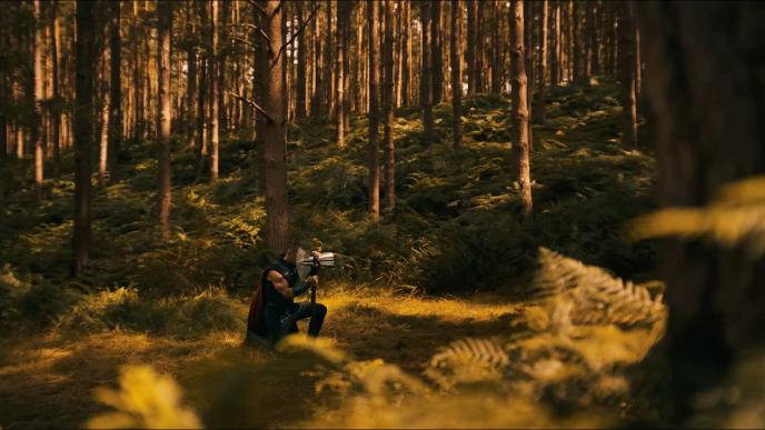 Chris Hemsworth as Thor in Avengers: Doomsday, kneeling in a forest