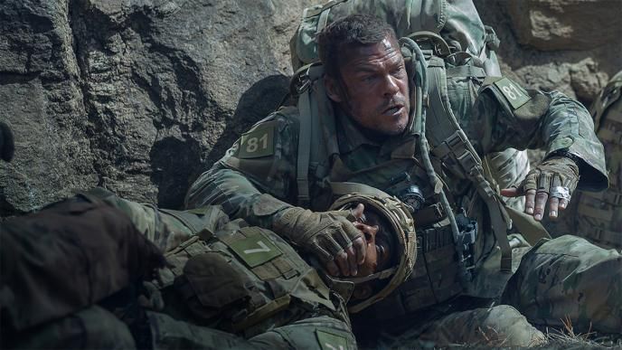 Alan Ritchson & a soldier injured in the battlefield