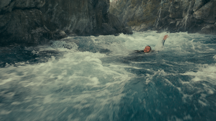 James swimming in the river 