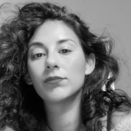 A black and white photo of Tasha Kokinasidis