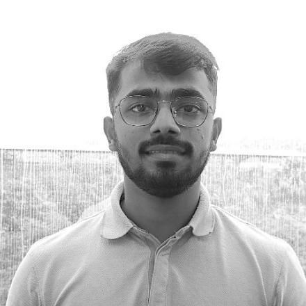 A black and white photo of Harshil Tank