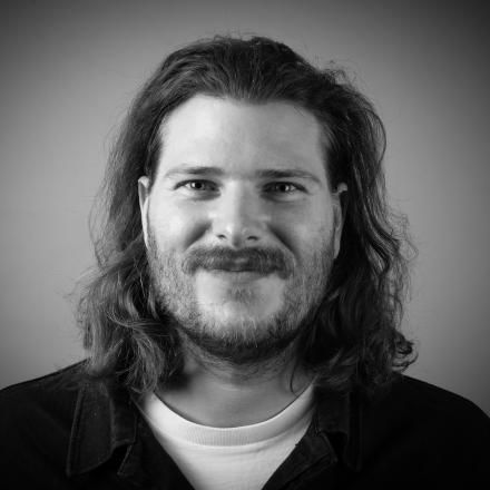 A black and white photo of Ian Landman