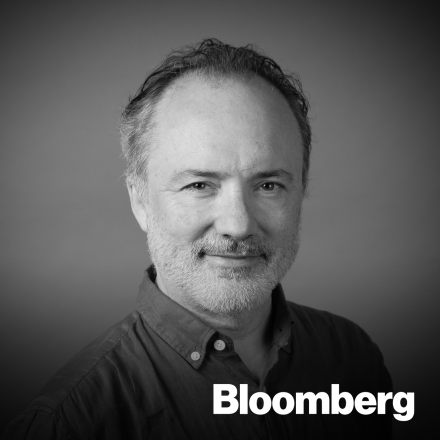 A headshot of Tim Webber with the Bloomberg logo in the bottom right corner.