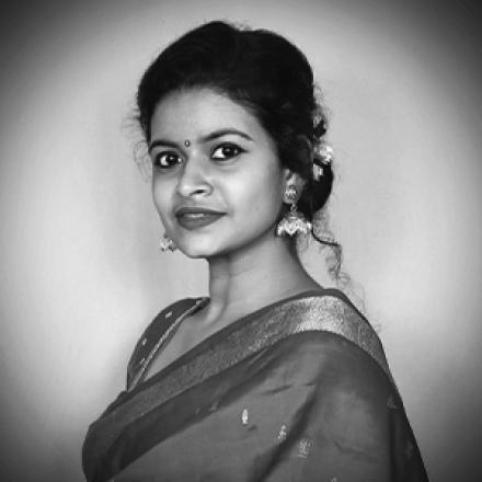 a black and white photograph of Trupti Shetty