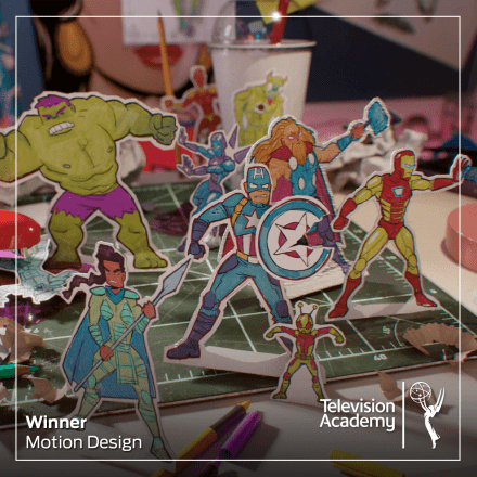 A still from Ms Marvel showing hand drawn animated character from the Avengers on popping out of a lined notebook.