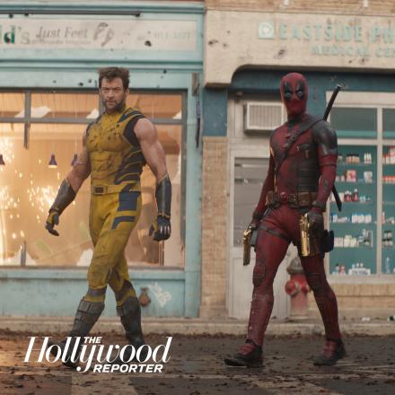 Deadpool x Wolverine amidst explosion 