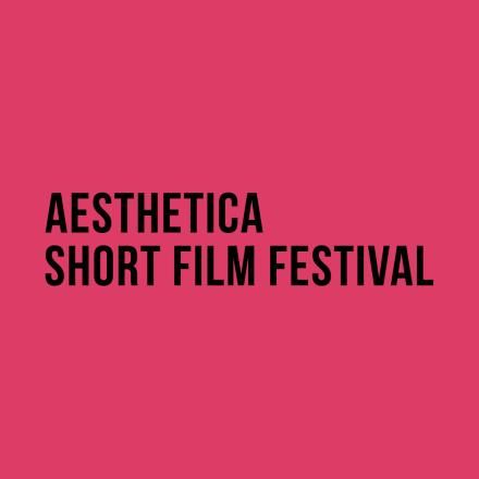 A fuchsia background with black text reading Aesthetica Short Film Festival.