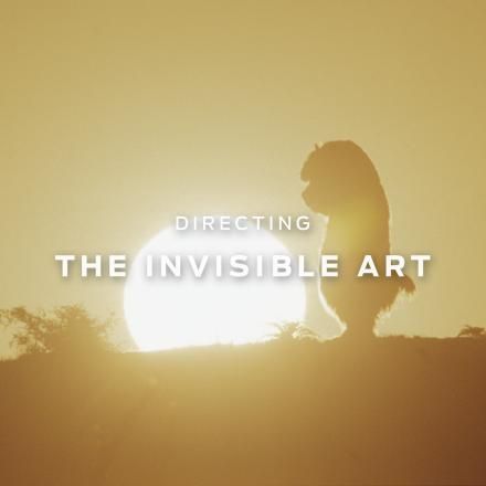 A still from Where the Wild Things Are showing a sunset with and animated creature looking down.