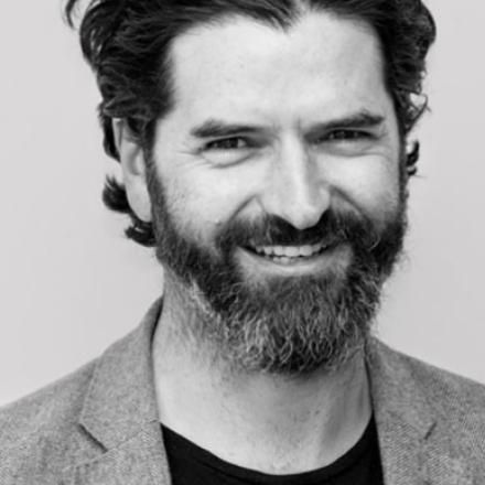 B&W headshot of Josh Simmonds