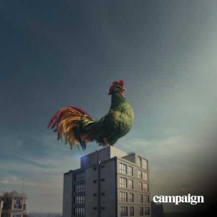 Still from Kellogg's cockerel Cornelius on top of building. Campaign logo bottom right corner