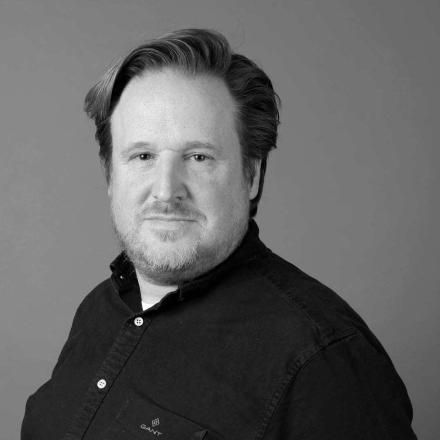 A black and white photograph of VFX Supervisor Christian Manz