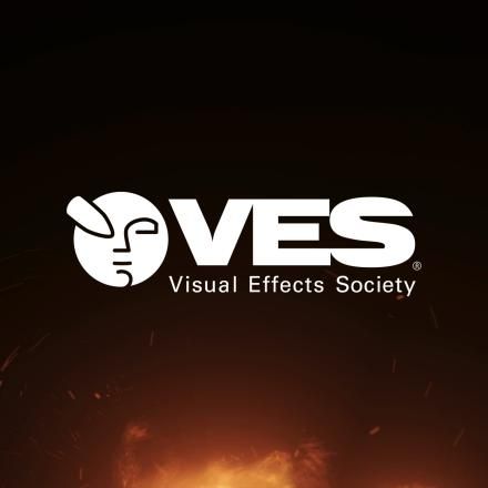 A CG flame and sparks background with a white Visual Effects Society Logo in the centre.