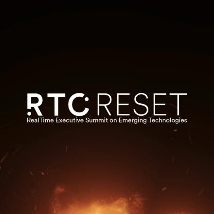 A white RESET logo on top of a black background with CGI sparks and fire at the bottom.