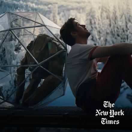 A CGI image of the character Rocky from Project Hail Mary in his ball, back to back with Ryan Gosling.