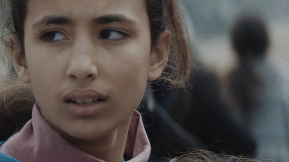 A still from the 'Save the Survivors' ad for Save the Children with the APA logo in the bottom left corner.