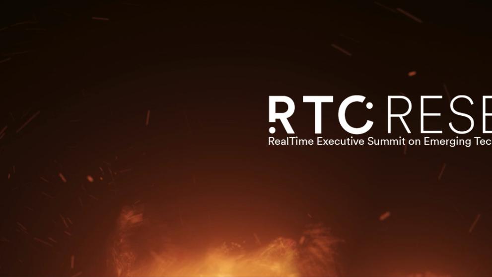 A white RESET logo on top of a black background with CGI sparks and fire at the bottom.