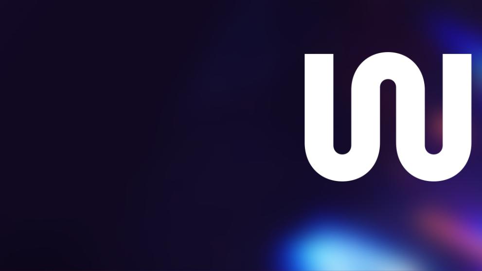 A CG background showing flares of light with a white W International Logo on the right hand side.