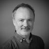 A black and white photo of Tim Webber